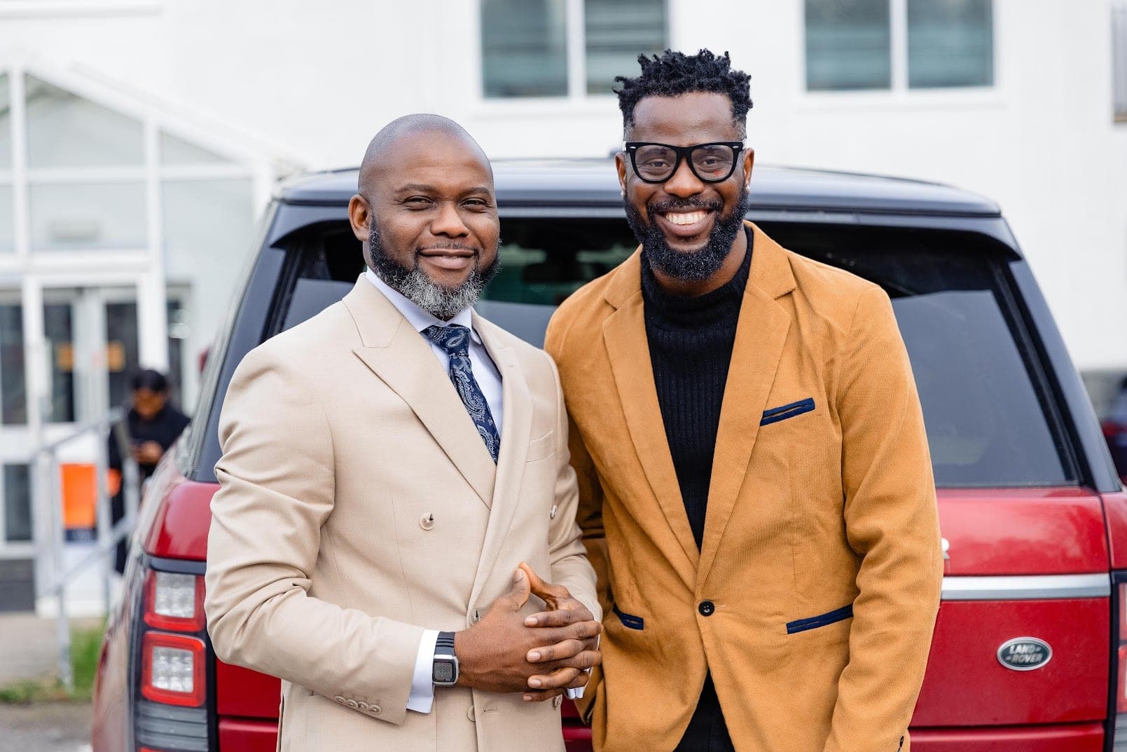 Two members outside the church